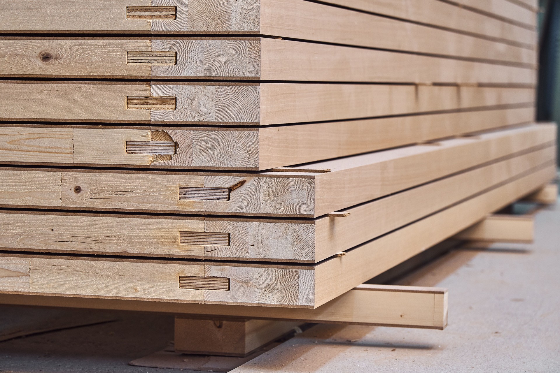 Joinery. Wood door manufacturing process. Stacked door leafs. Furniture manufacture.